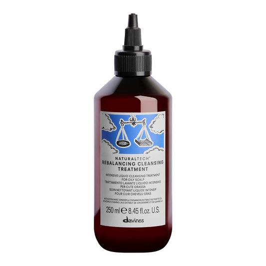 Bottle of Davines Rebalancing Cleansing Treatment on a white background
